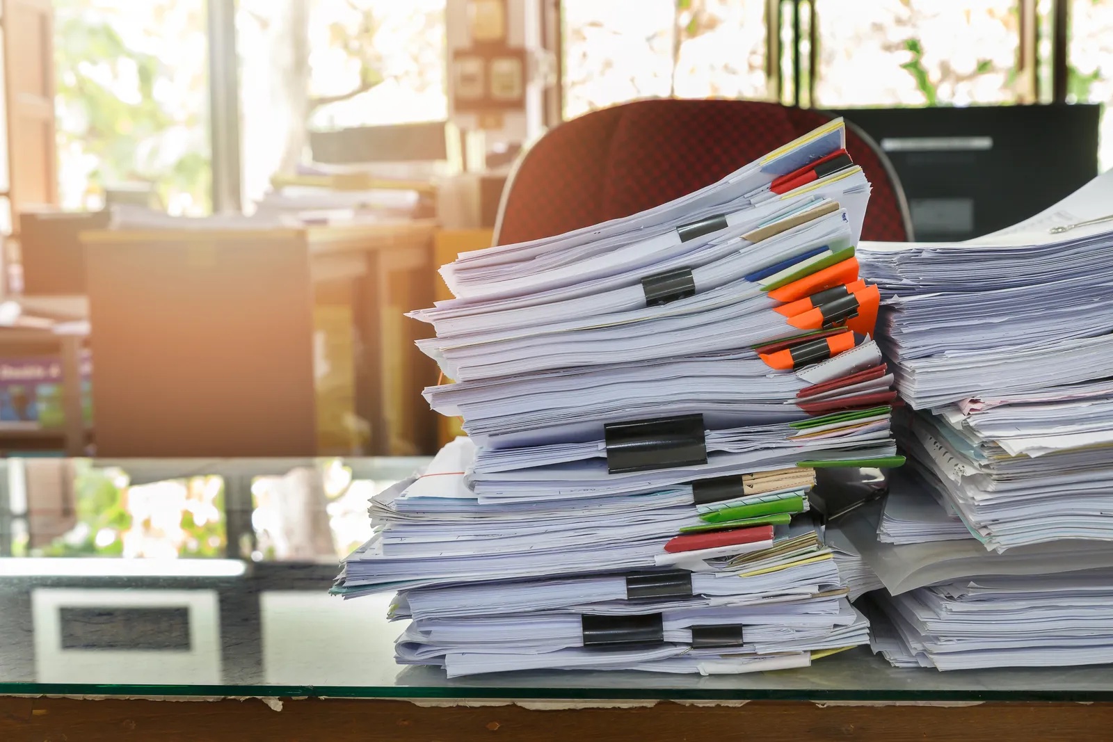 Stacks of paperwork that the automated system replaced